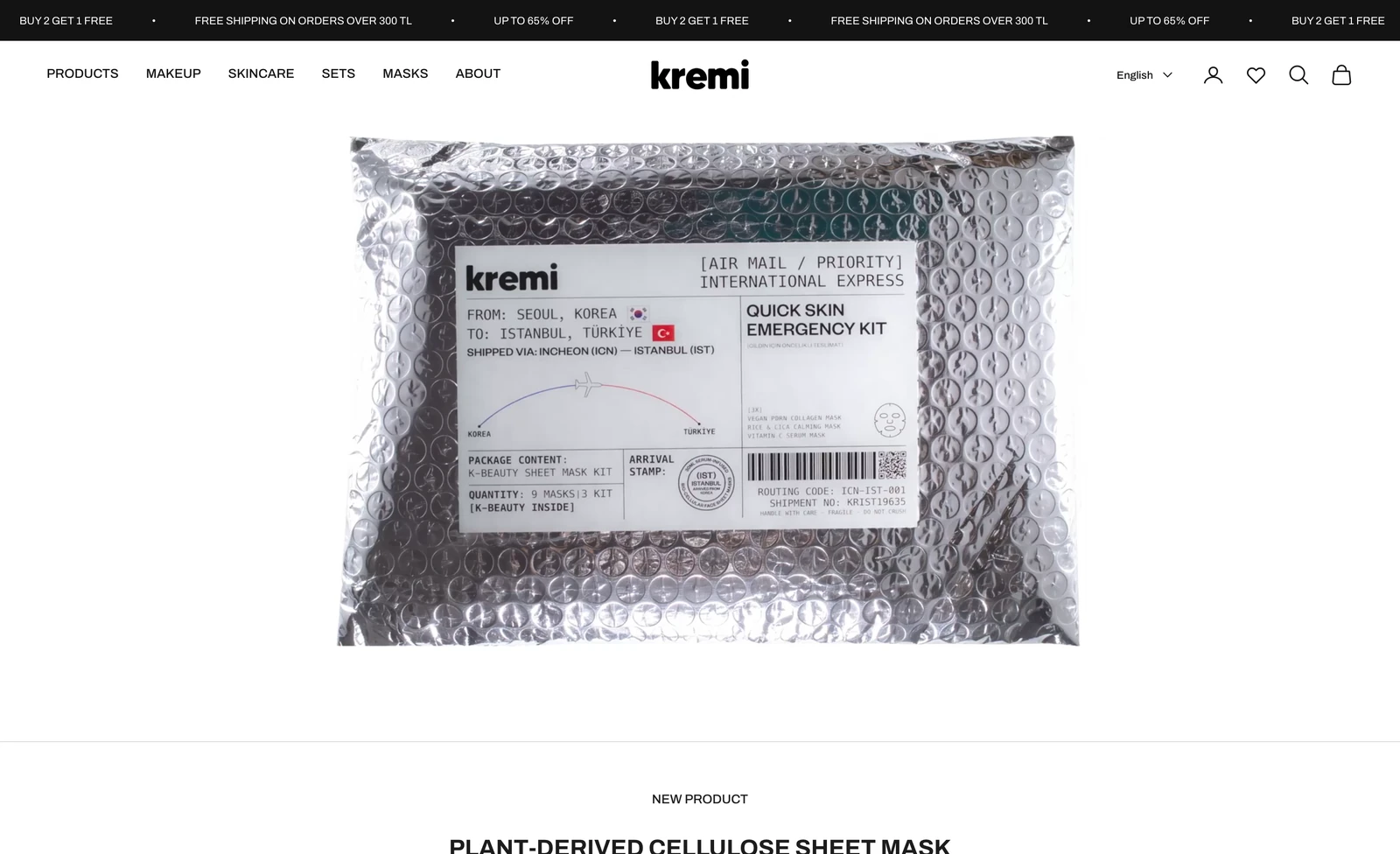 The Kremi storefront home page: announcement ticker, header with navigation and language switcher, and a full-width hero image of a shipping pouch.